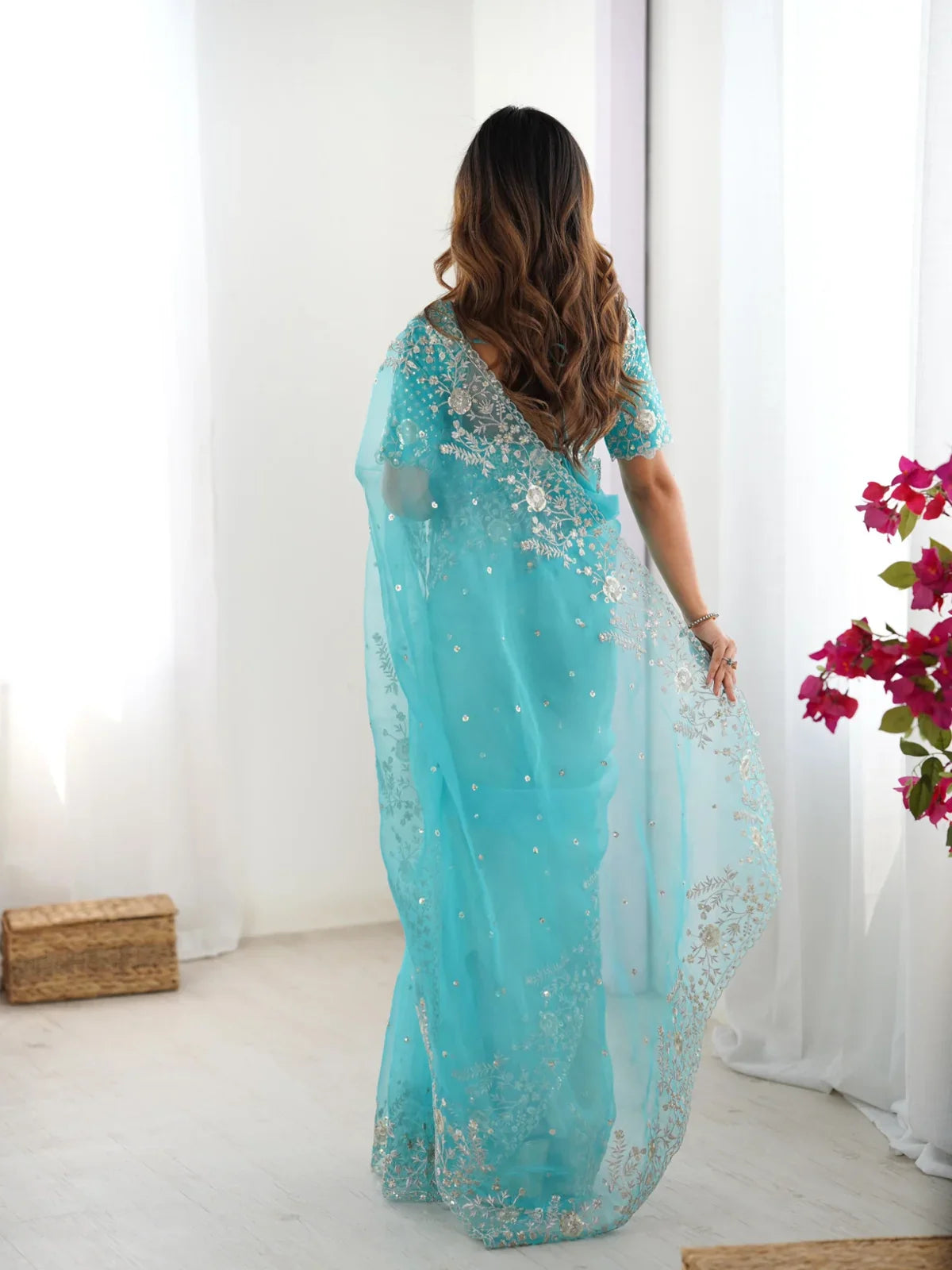 Back view of Tarani embroidered organza saree with designer pallu and detailing