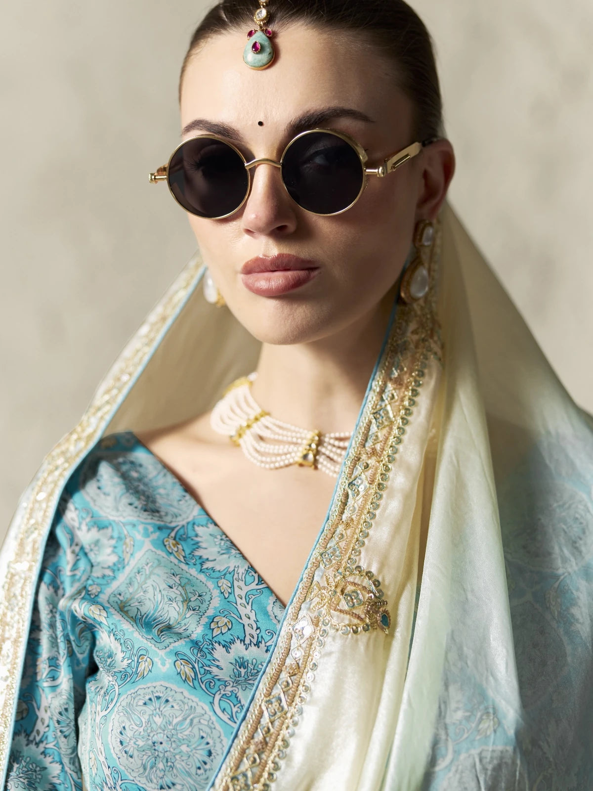 Tarani blue embroidered organza saree upper body view with digital print blouse and jewellery styling