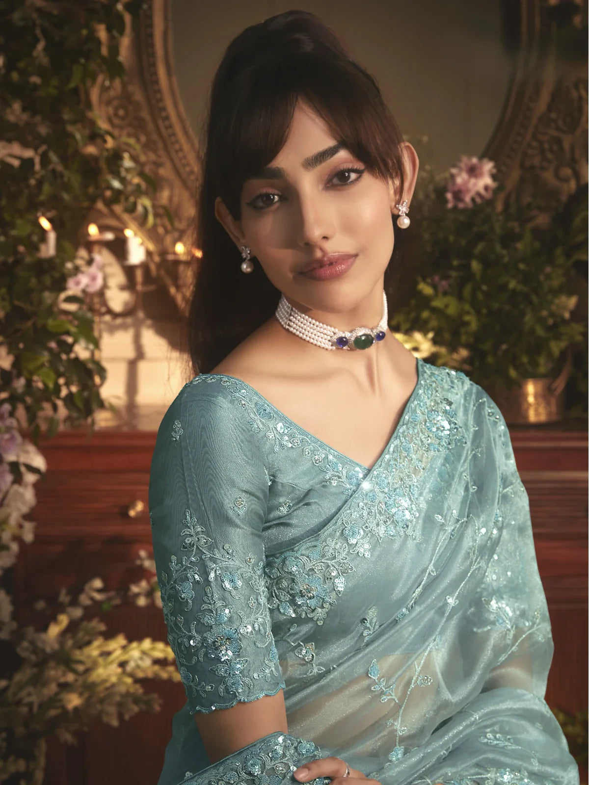 Tarani blue organza saree with embroidery and stone work blouse upper body view