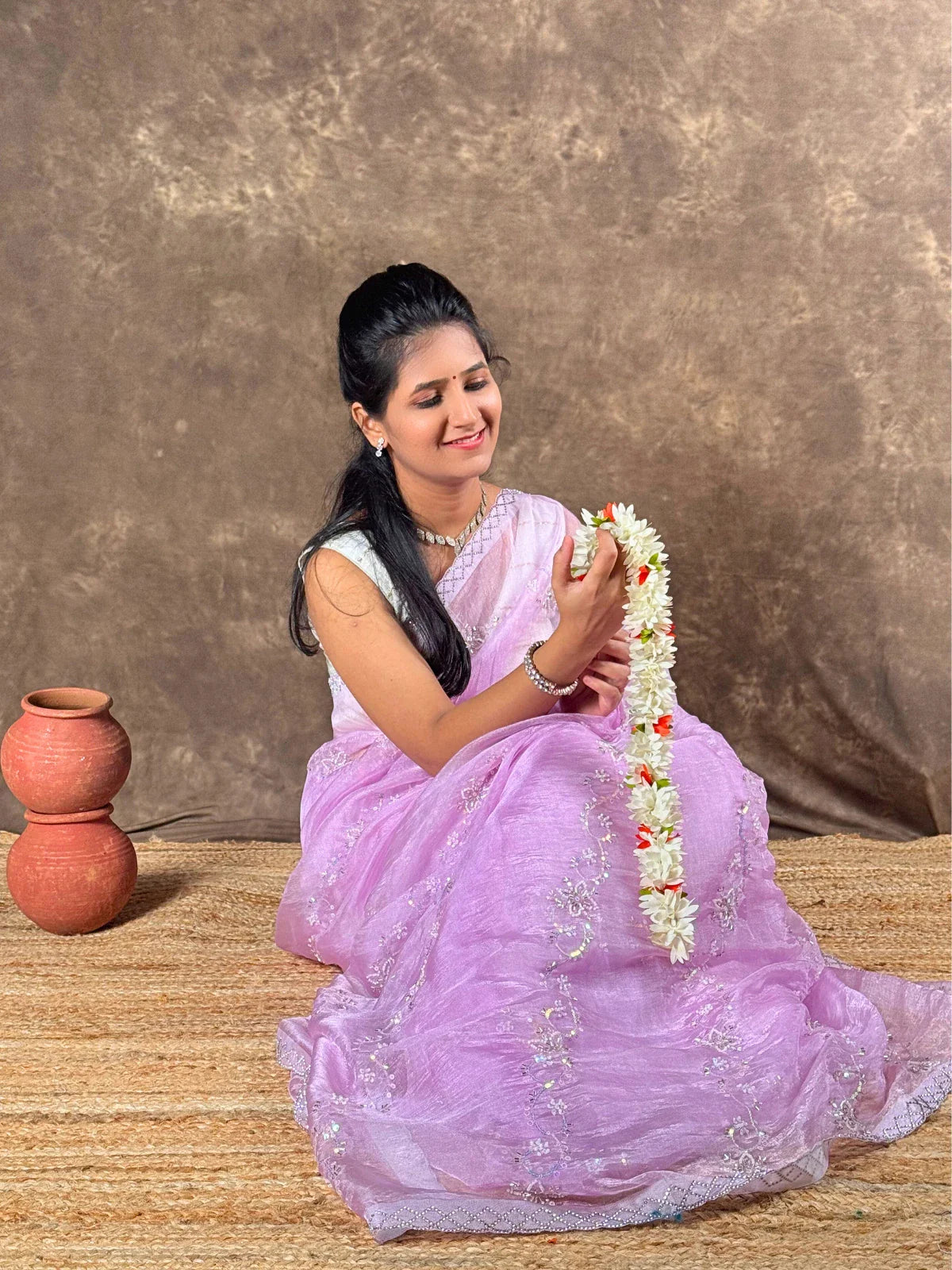 Tarani lavender organza saree front view with festive embroidery