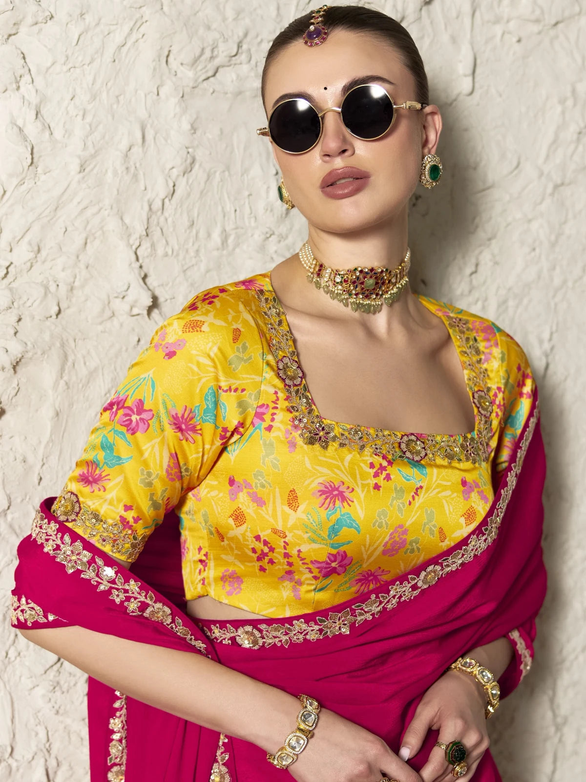 Tarani magenta organza saree upper body view with floral embroidered blouse and jewellery styling