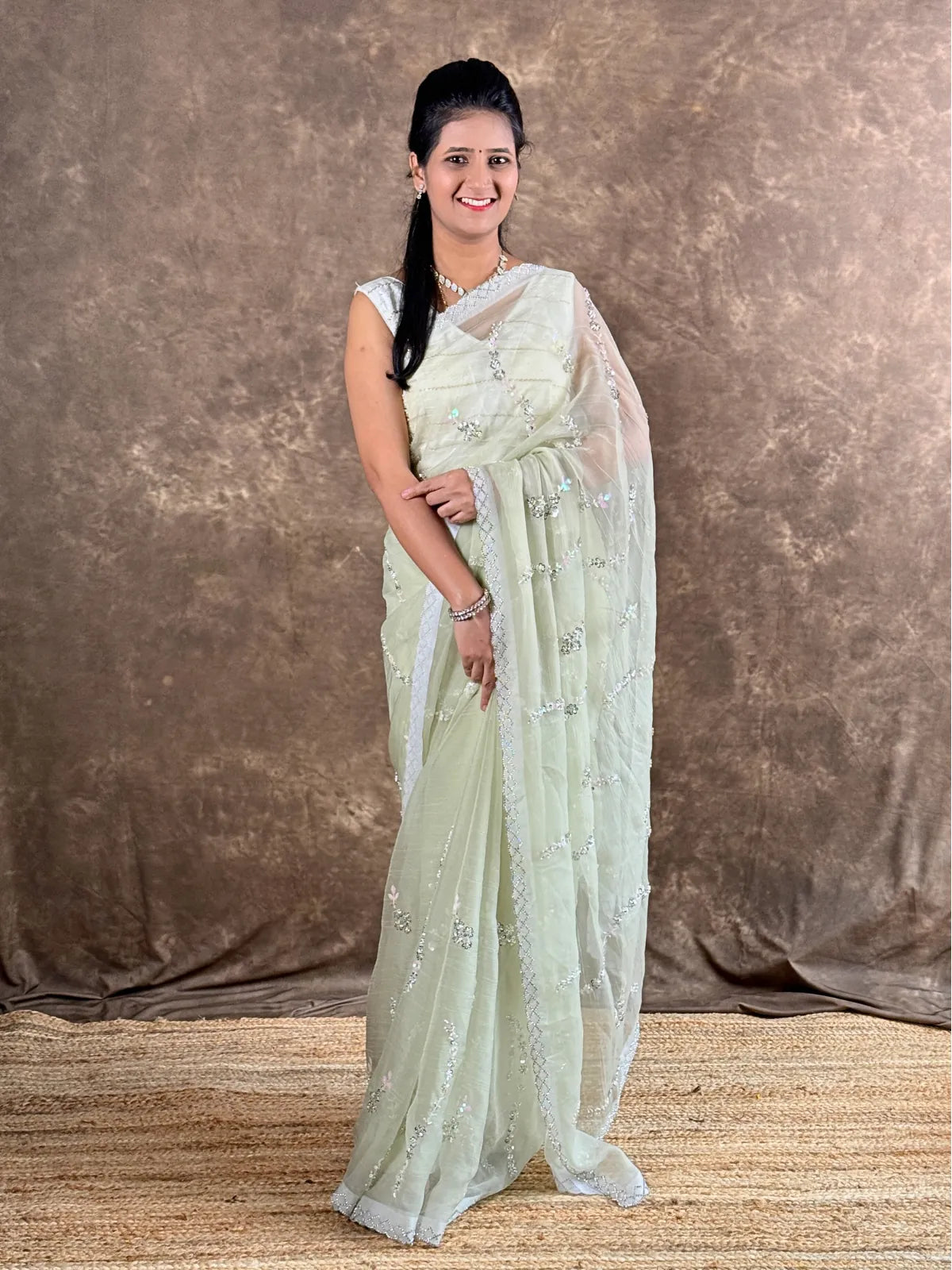 Tarani premium green silk saree full view with woven design perfect for festive wear