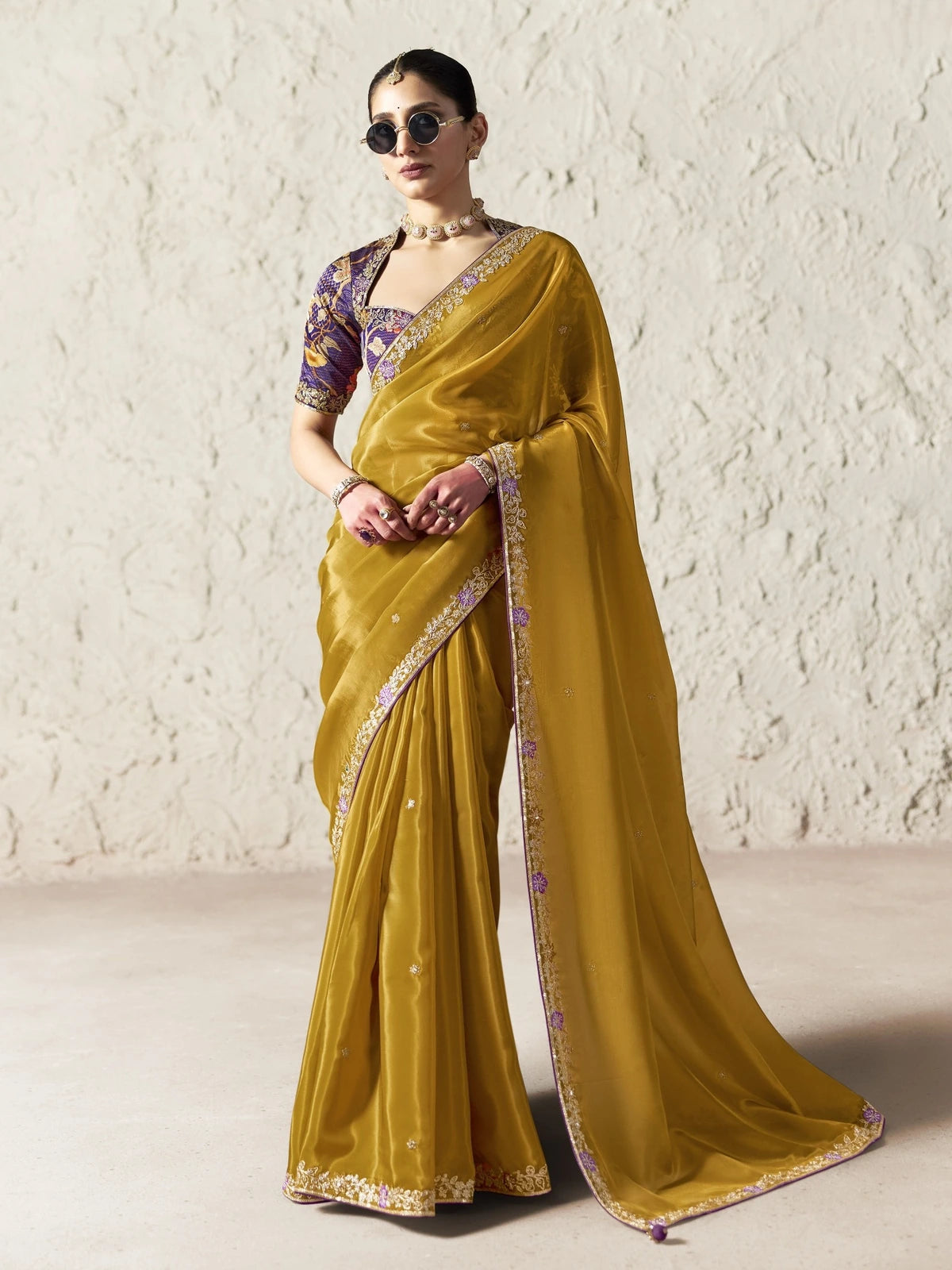 Tarani mustard organza saree full view with embroidered border and designer blouse for festive wear