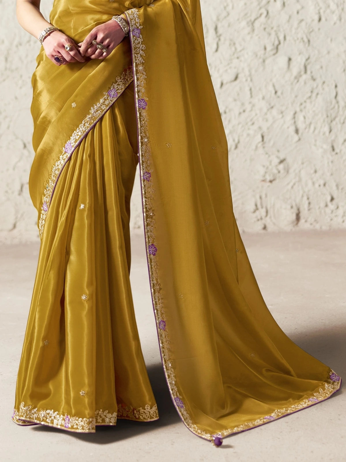 Tarani mustard organza saree pallu view with sequins embroidery border detailing