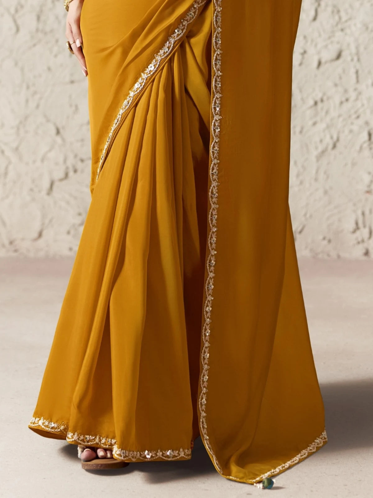 Tarani mustard organza saree pallu and border embroidery closeup for festive party wear