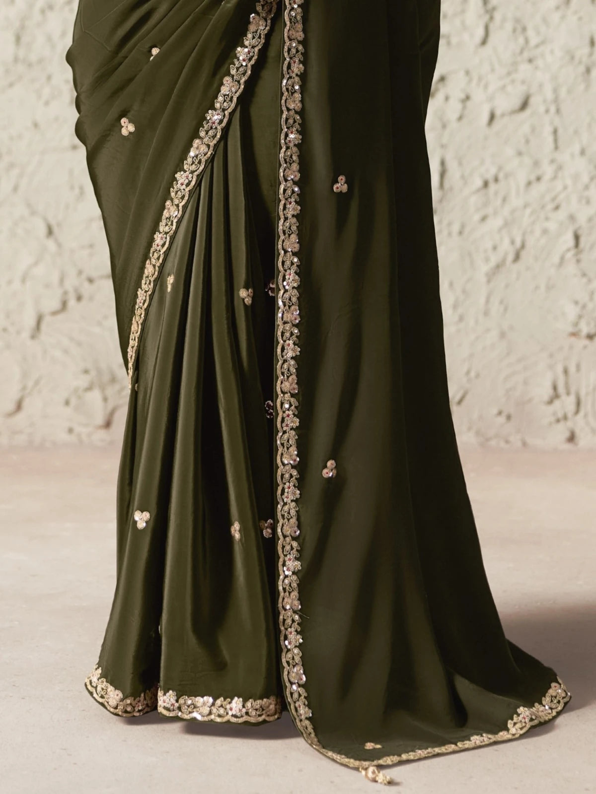 Tarani olive green saree closeup with sequins embroidery border detailing