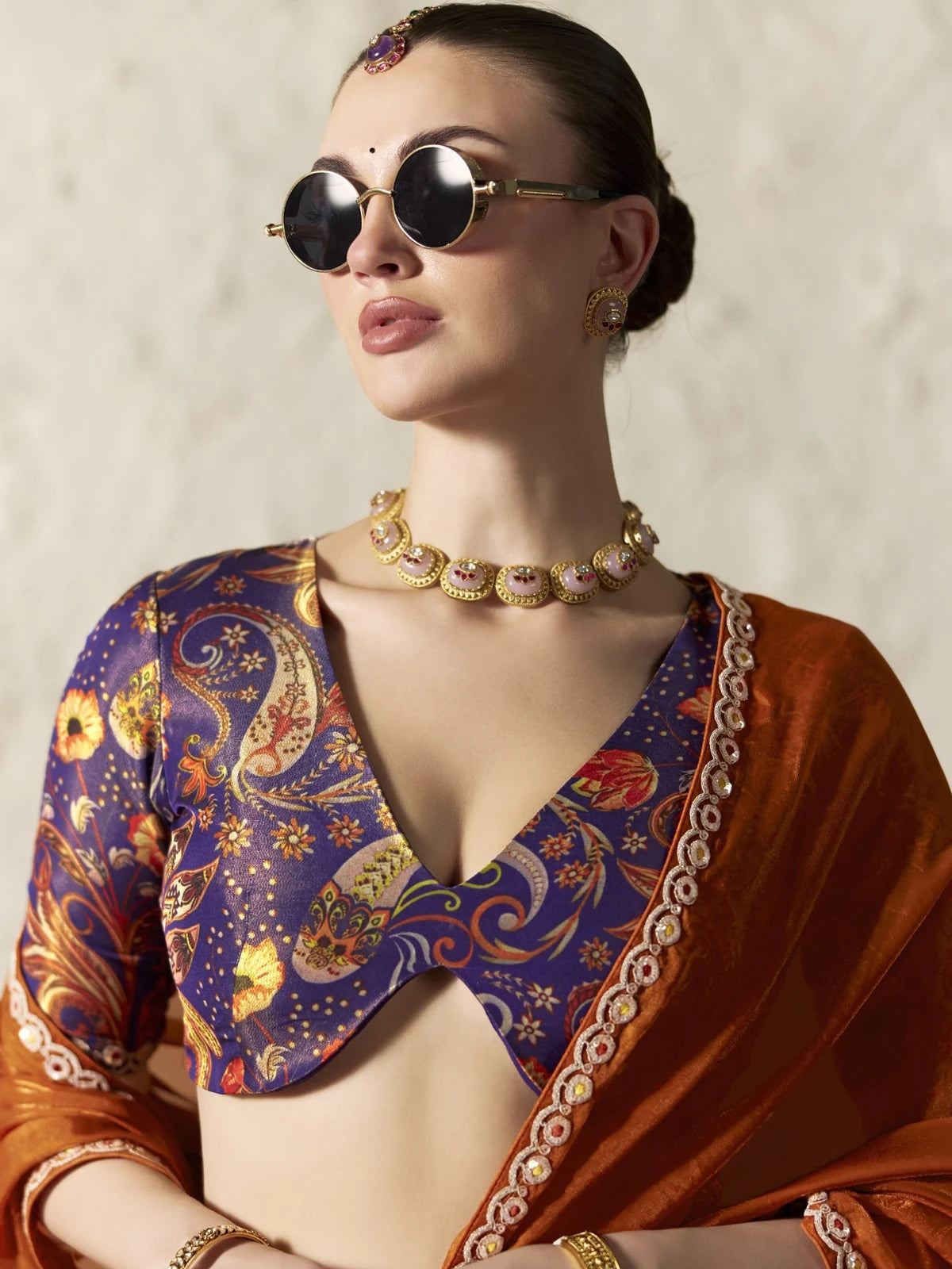 Tarani rust orange party wear organza saree blouse closeup with embroidery lace work