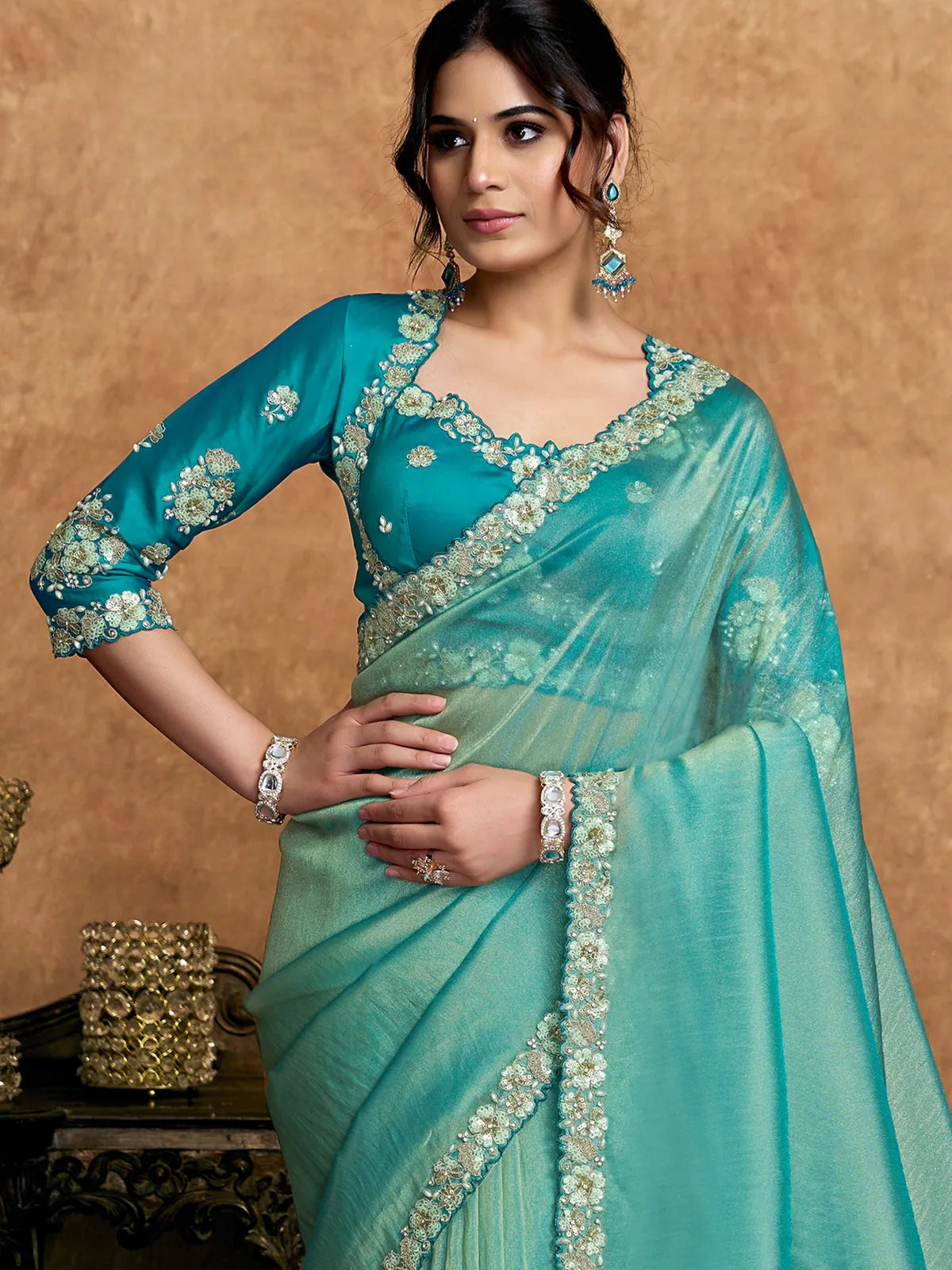 Tarani teal Zari Organza Satin saree with sequin pearl stone embroidery front view Archaya