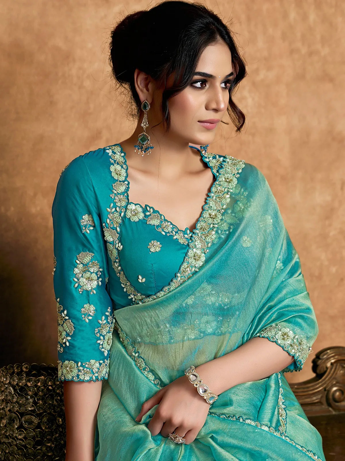 Tarani teal Zari Organza Satin saree with sequin pearl stone embroidery upper body view Archaya