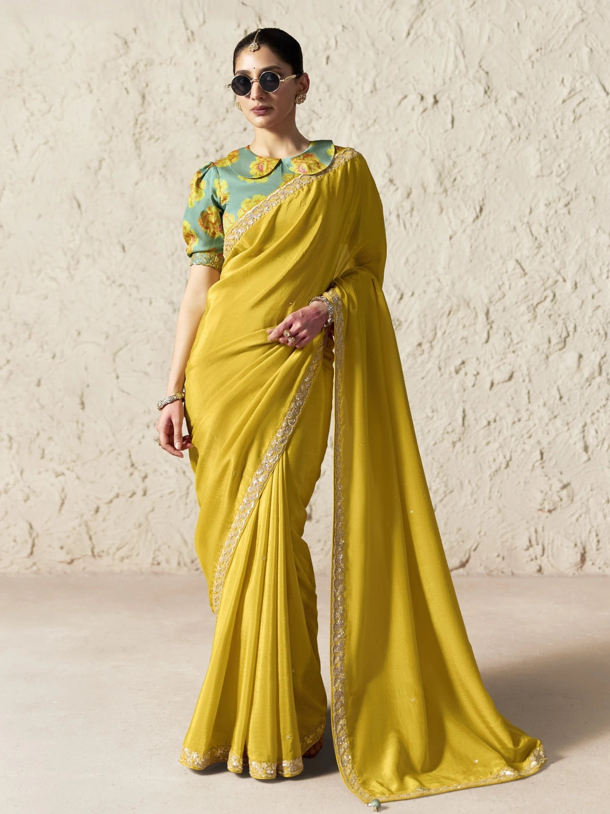 Tarani yellow organza saree full view with sequins embroidery and floral blouse for festive party wear