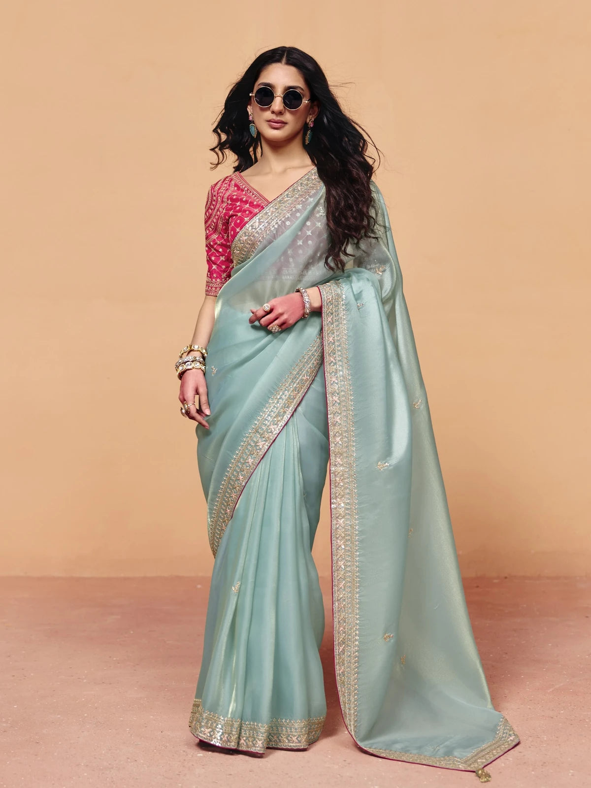 Tarani pastel green organza satin saree with sequince embroidery full view for festive party wear