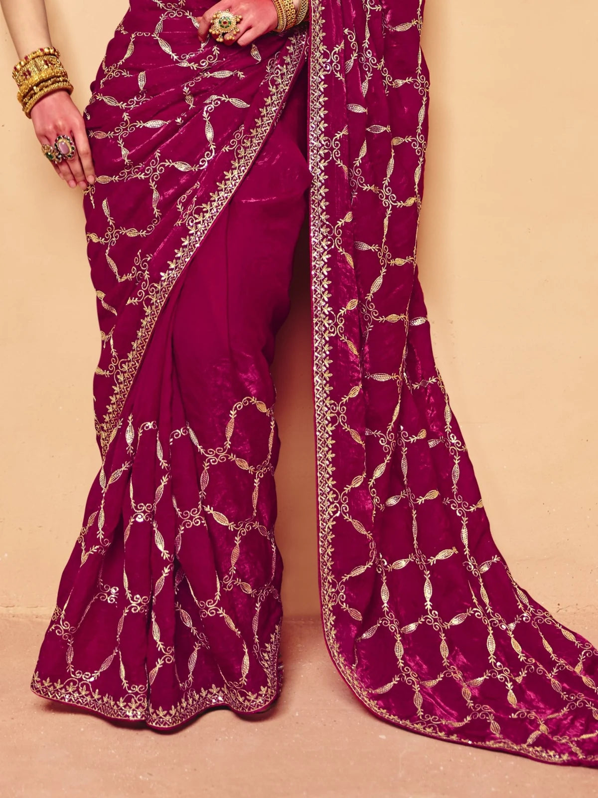 Tarani magenta organza satin saree pallu view with golden sequence embroidery border detailing