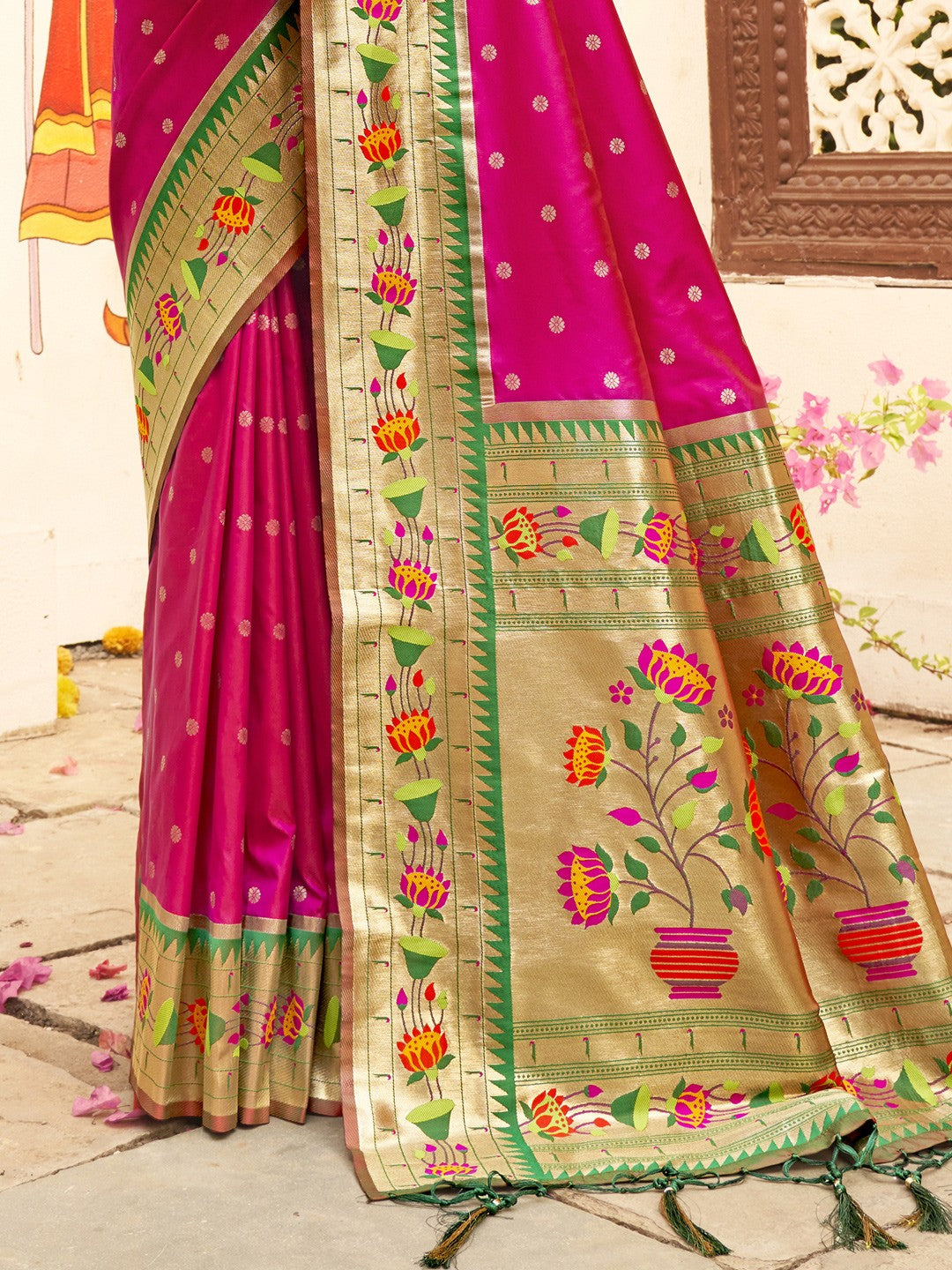 Tarani pink paithani silk saree pallu view highlighting zari weaving and floral motifs
