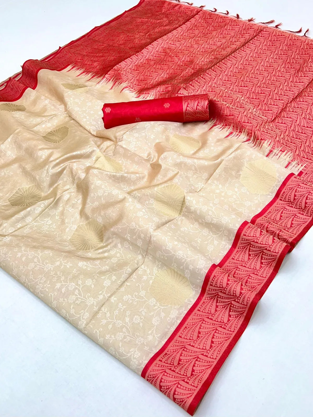 Tarani handloom paper silk saree with intricate motifs and woven texture in beige and red tones