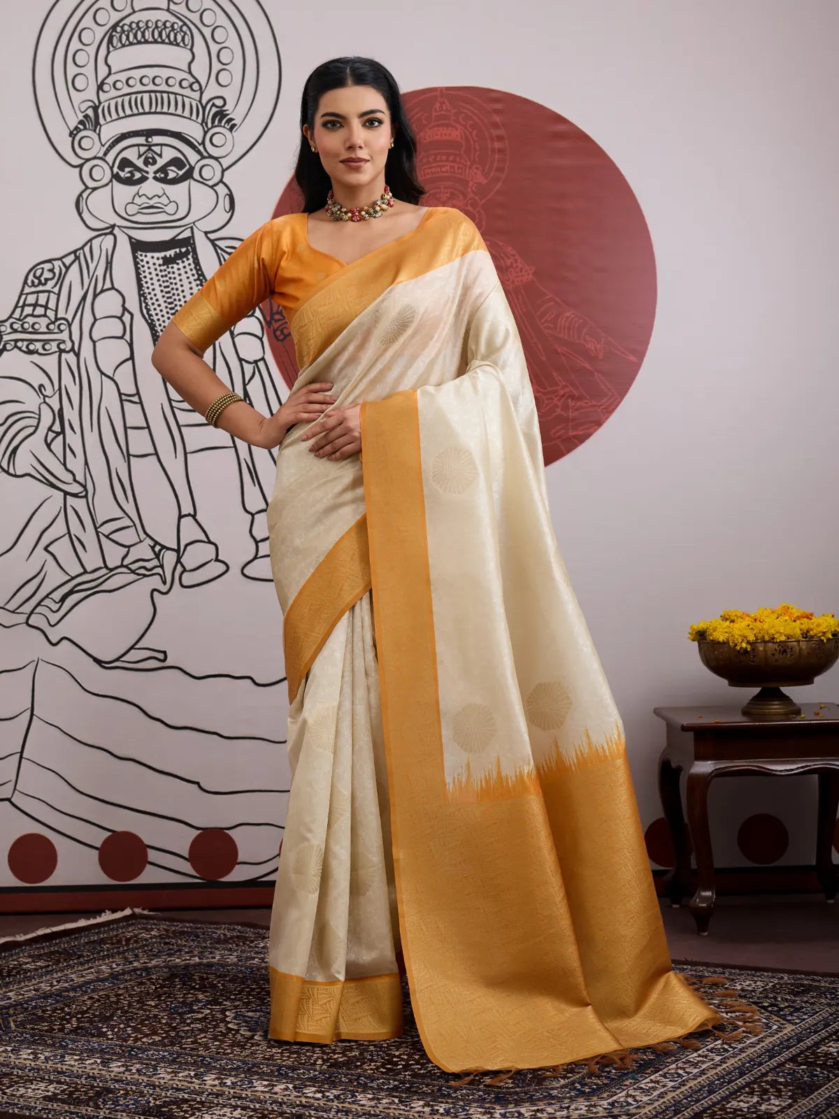 Tarani cream handloom paper silk saree with golden blouse front view for festive and traditional wear