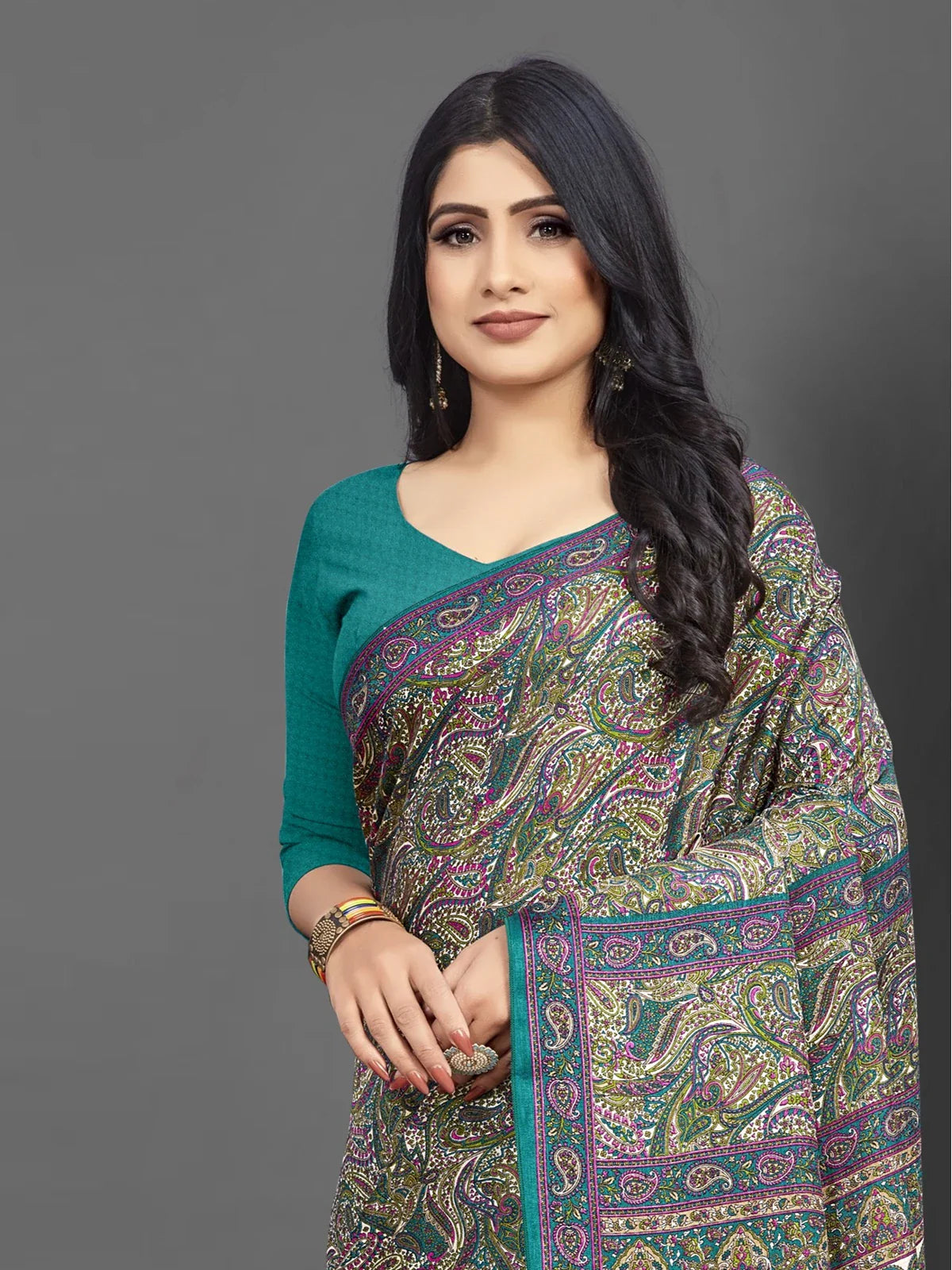 Tarani teal green Pashmina silk saree upper body view highlighting blouse and border detailing