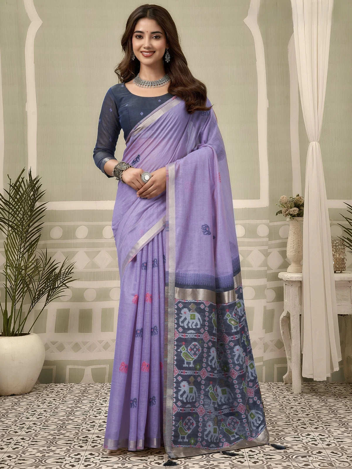 Tarani lavender Patola saree full view with woven zari border and fancy tassels for casual and summer wear