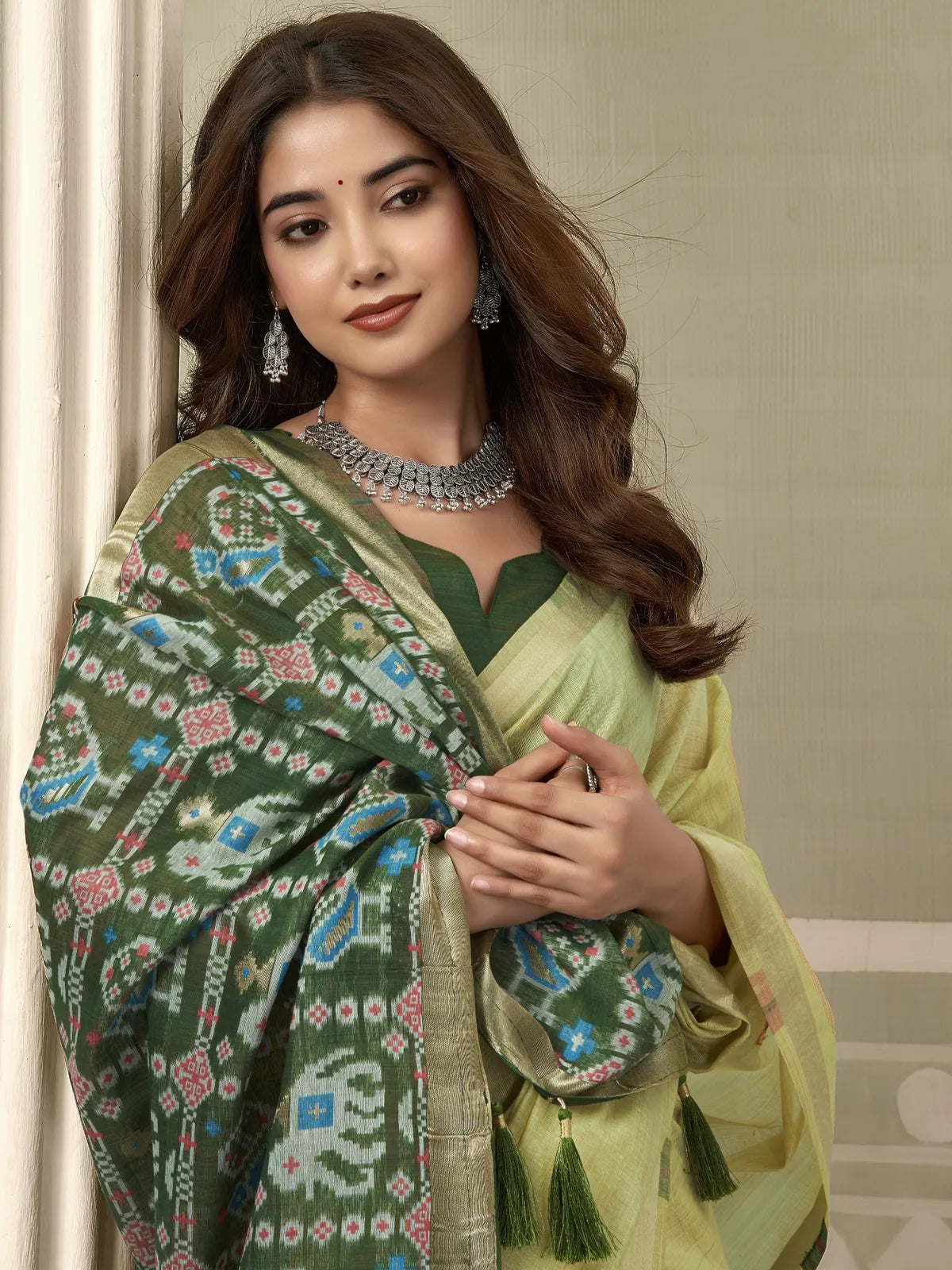 Tarani light green Patola saree upper body view highlighting woven Patola pallu