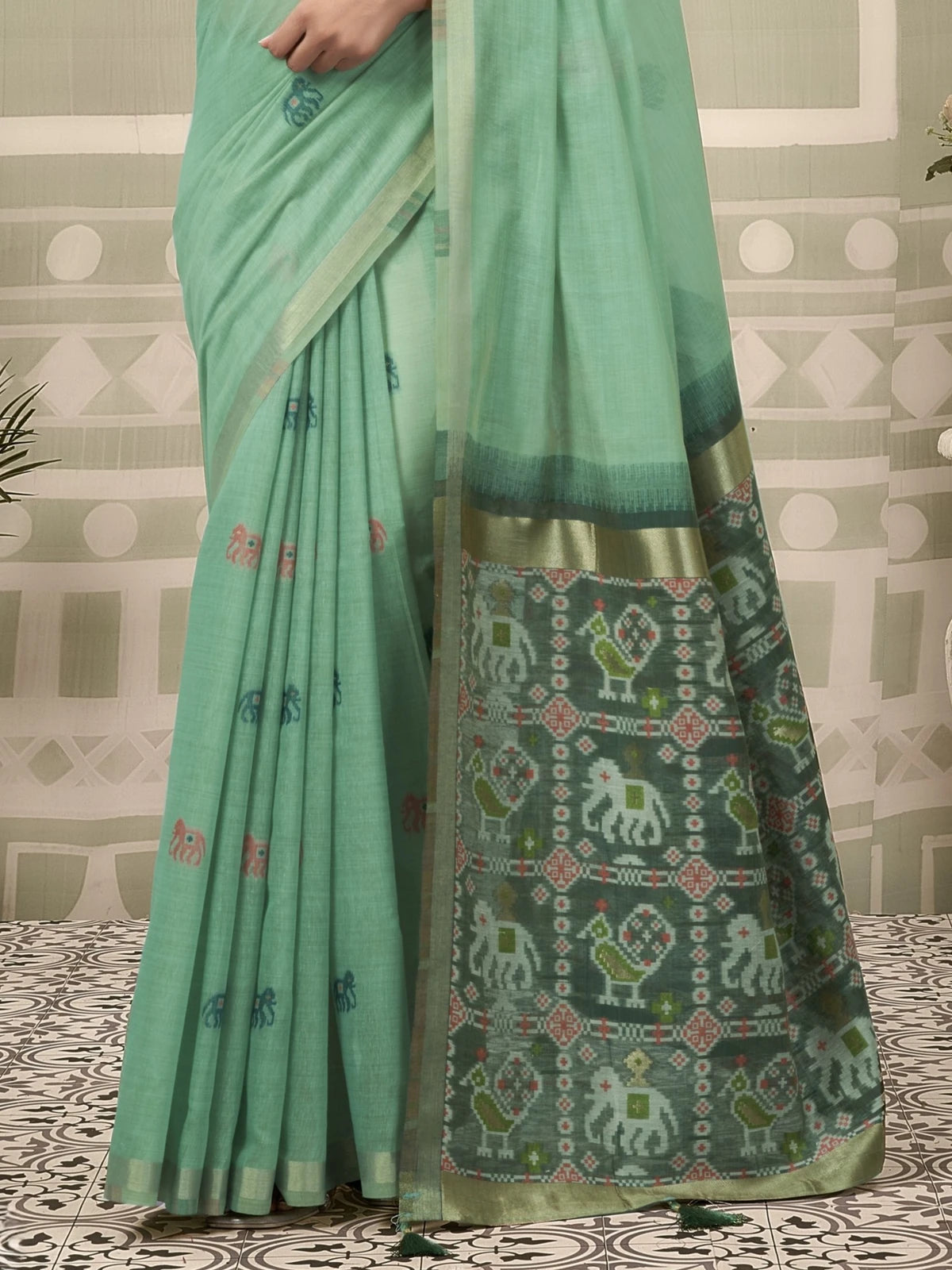Tarani mint green Patola pallu close view with zari border