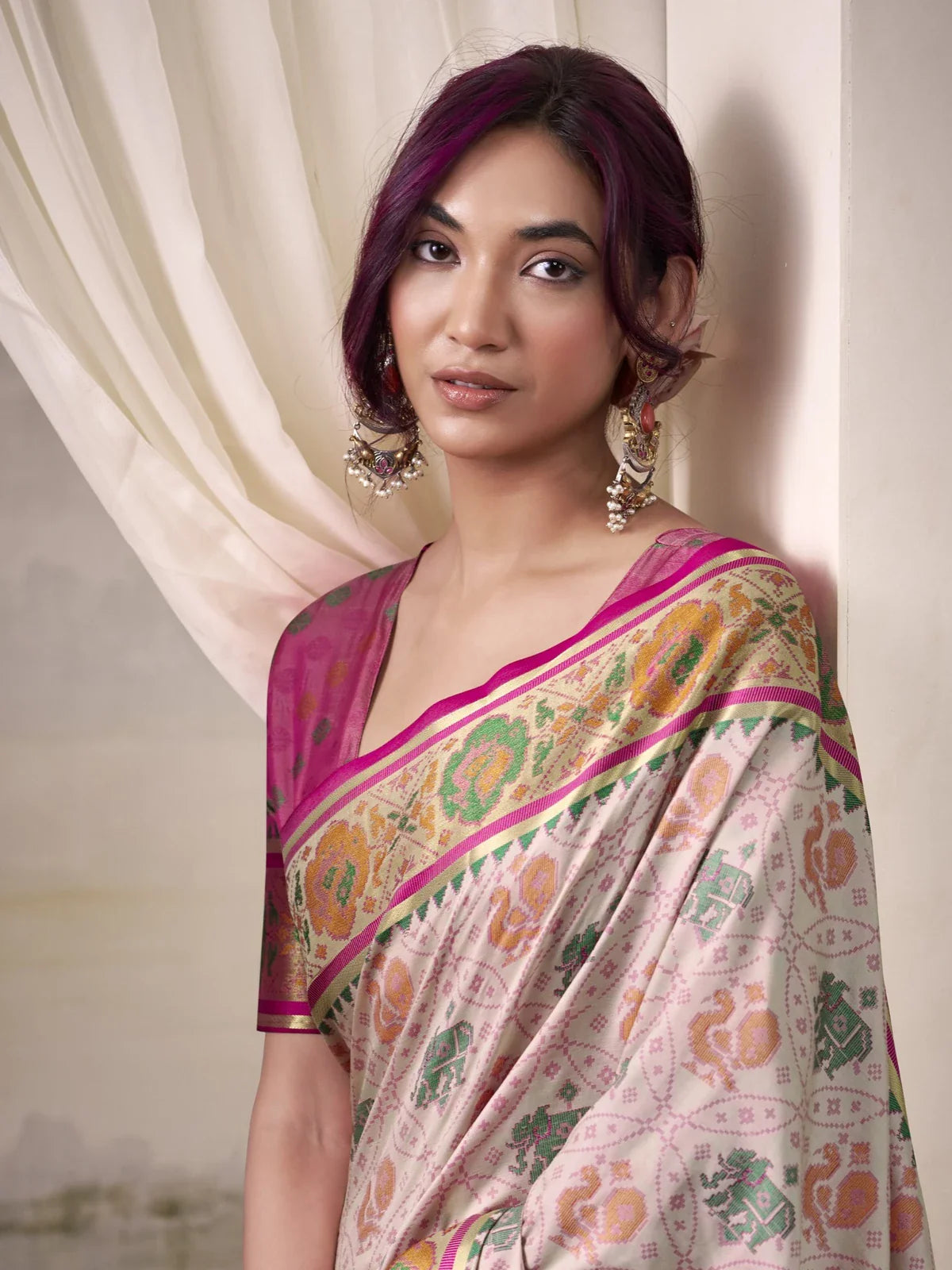 Tarani pink patola silk saree upper body view with dual tone blouse