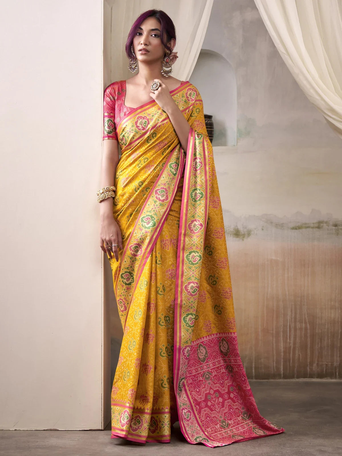 Tarani patola silk yellow saree full view with woven blouse for festive and bridal wear