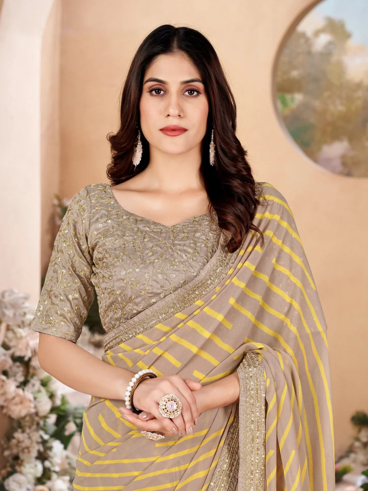 Tarani premium beige yellow leheriya saree upper body view with embroidered silk blouse