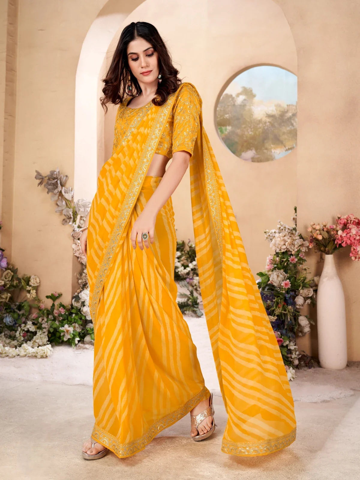 Tarani yellow leheriya poly georgette saree with embroidered silk blend blouse full view