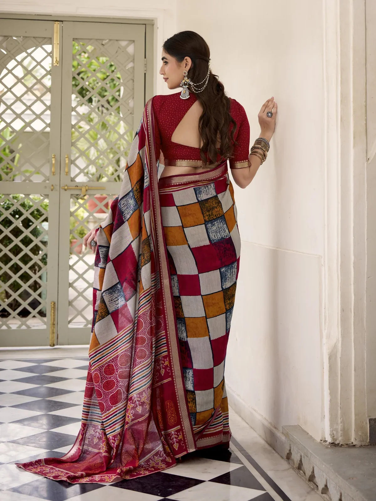 Tarani jeevana Maroon Chanderi saree drape detail view for festive party and wedding wear