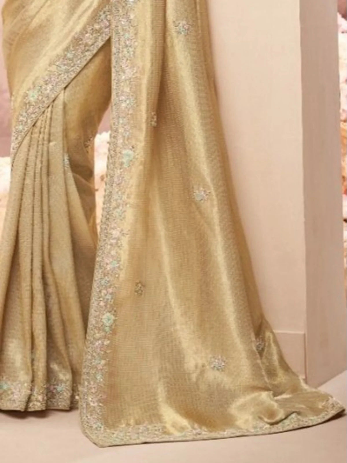 Tarani golden saree fabric closeup with weaving and hand work floral detailing