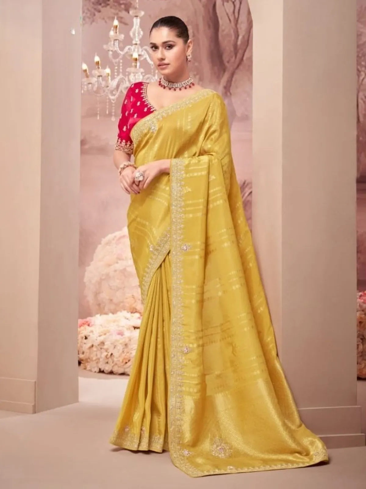 Tarani yellow designer saree full view with red embroidered blouse for festive party wear