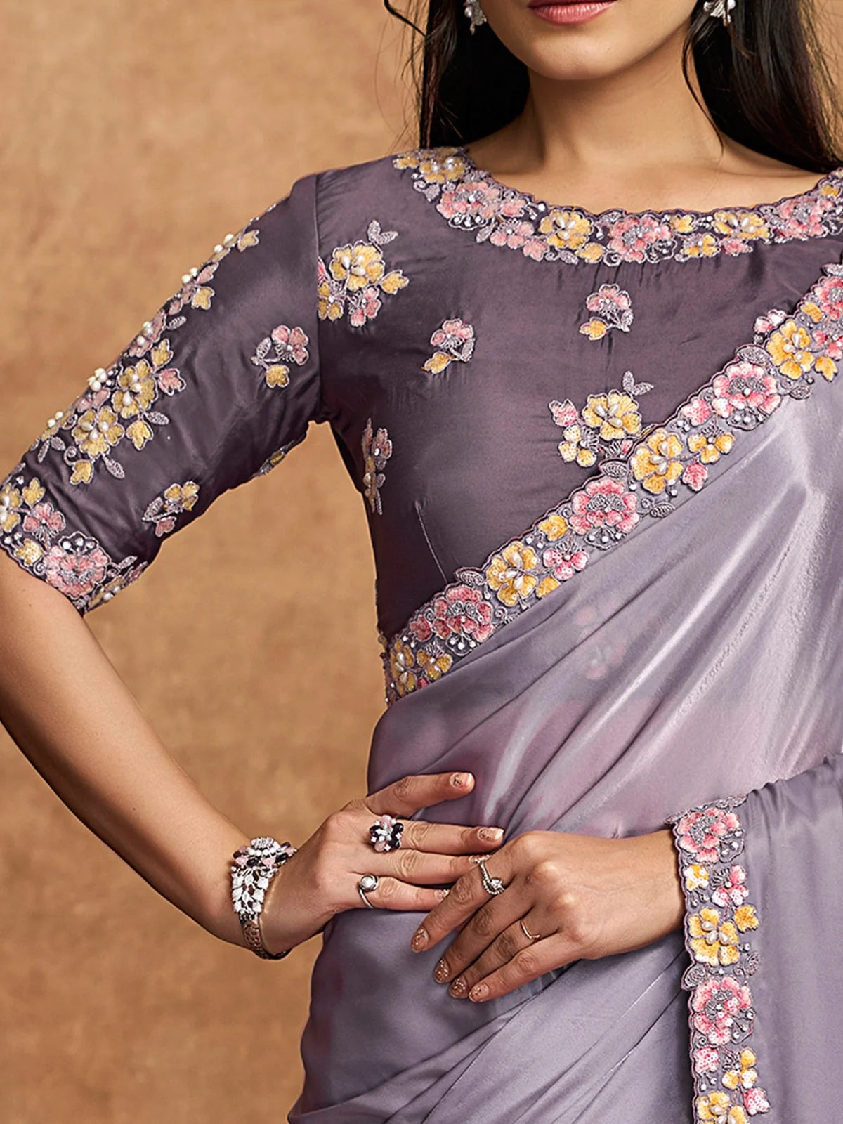 Tarani blouse view of lavender Pure Crepe Satin saree with floral embroidery and pearl detailing
