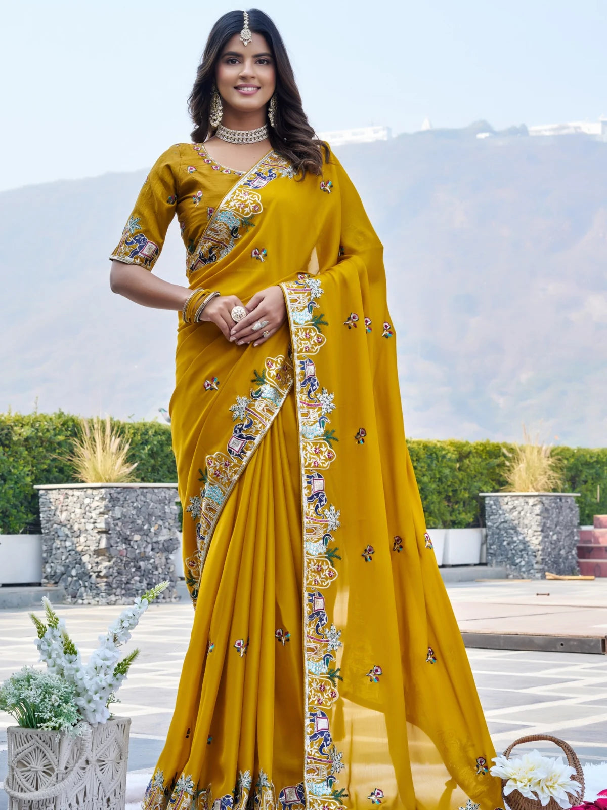 Tarani mustard designer saree full front pose with sequence embroidery and elegant drape