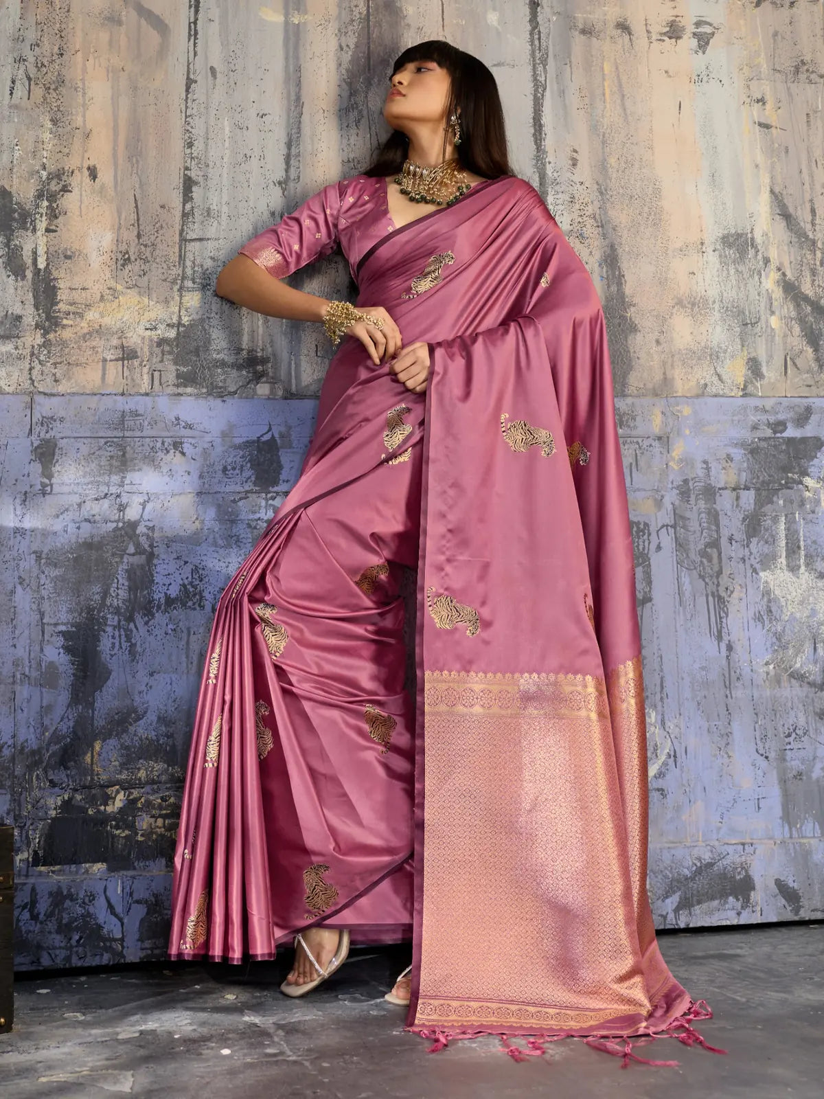Tarani pink designer satin saree side pose with elegant festive drape styling