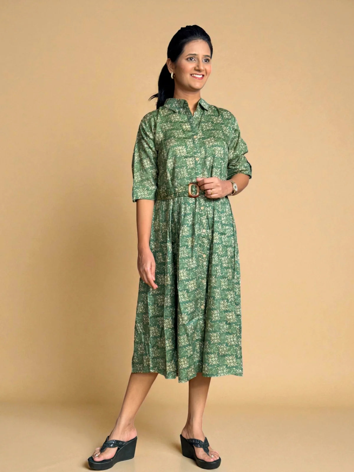 Tarani green rayon midi dress front pose highlighting comfort and structure