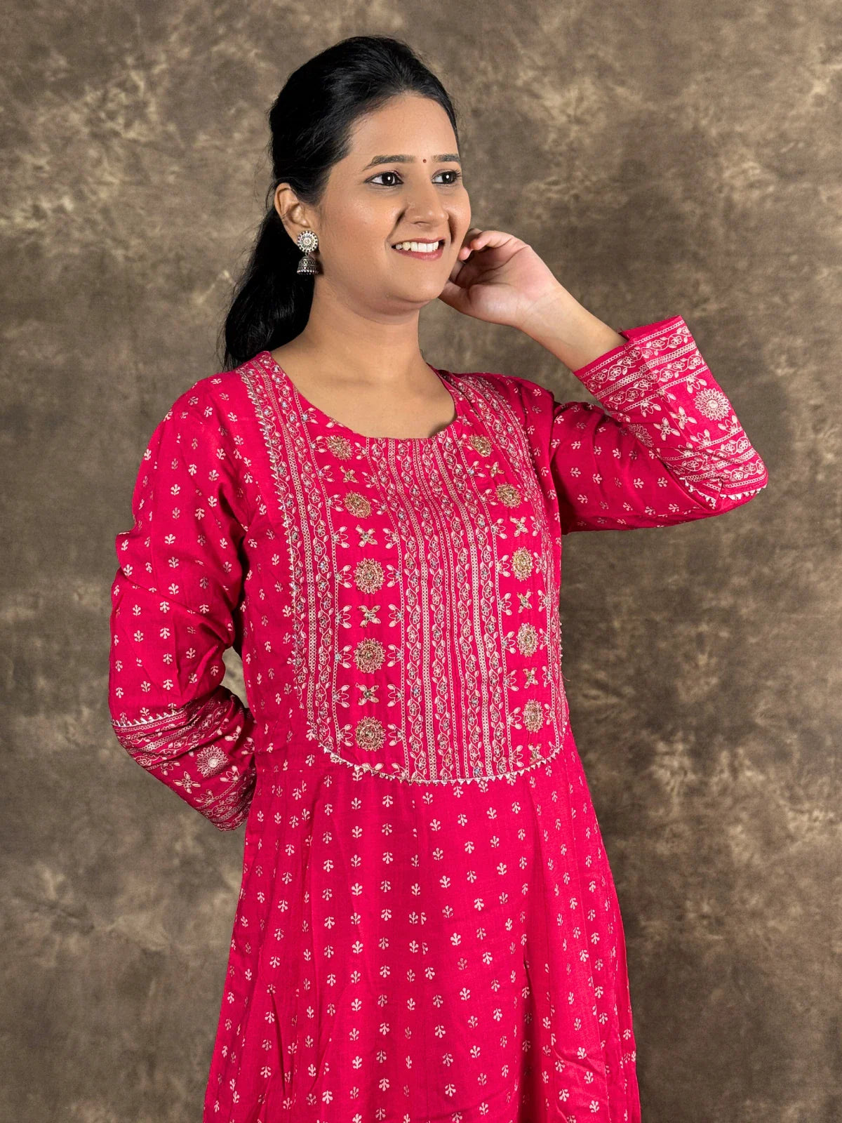 Tarani pink rayon anarkali dress upper body view with embroidered neckline