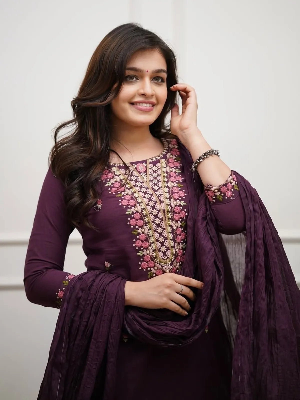 Tarani rayon dress in deep purple with close-up floral embroidery on neckline and sleeves