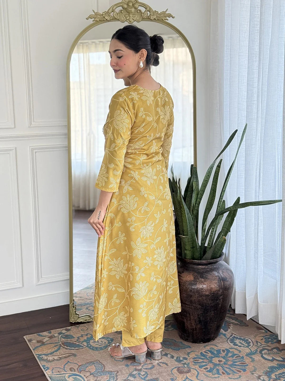Tarani rayon yellow dress back design view with floral print and silhouette clarity