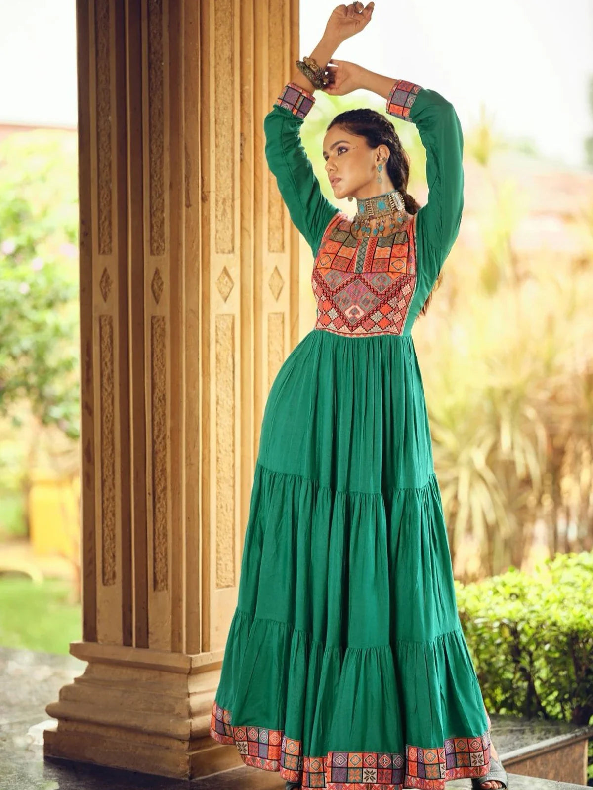 Tarani green rayon party gown front pose with traditional jacquard embroidery