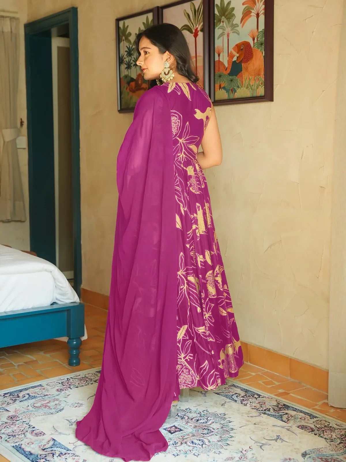 Back view of Tarani rayon festive gown in magenta with flowing silhouette and dupatta