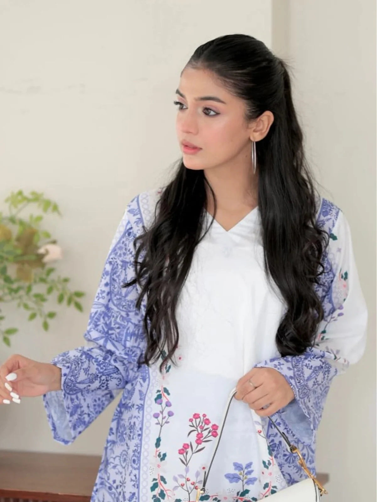 Tarani reyon dress upper body white and blue printed kurti with full sleeves front half pose