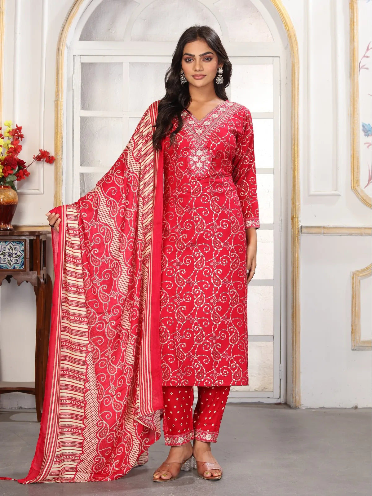 Front pose of Tarani festive red riyon dress with pants and dupatta in full style