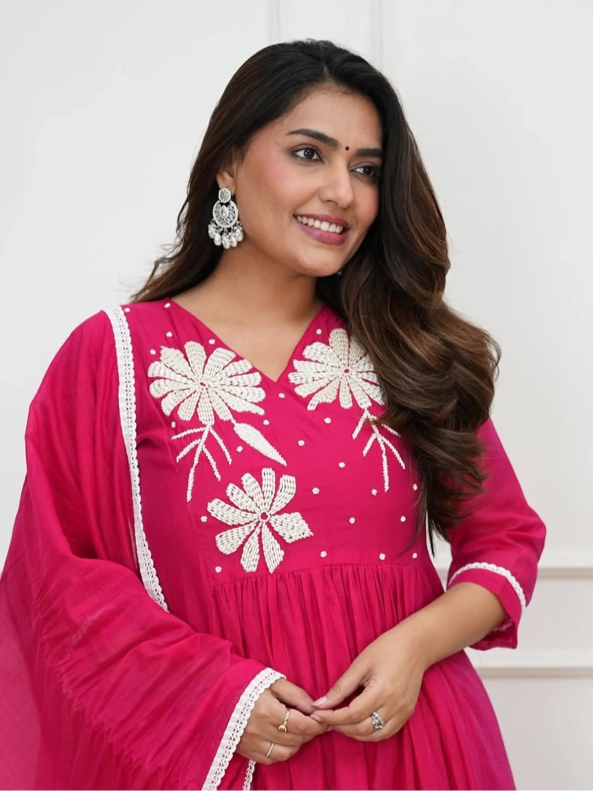 Tarani pink Roman party dress showing neckline embroidery and hand work in close view