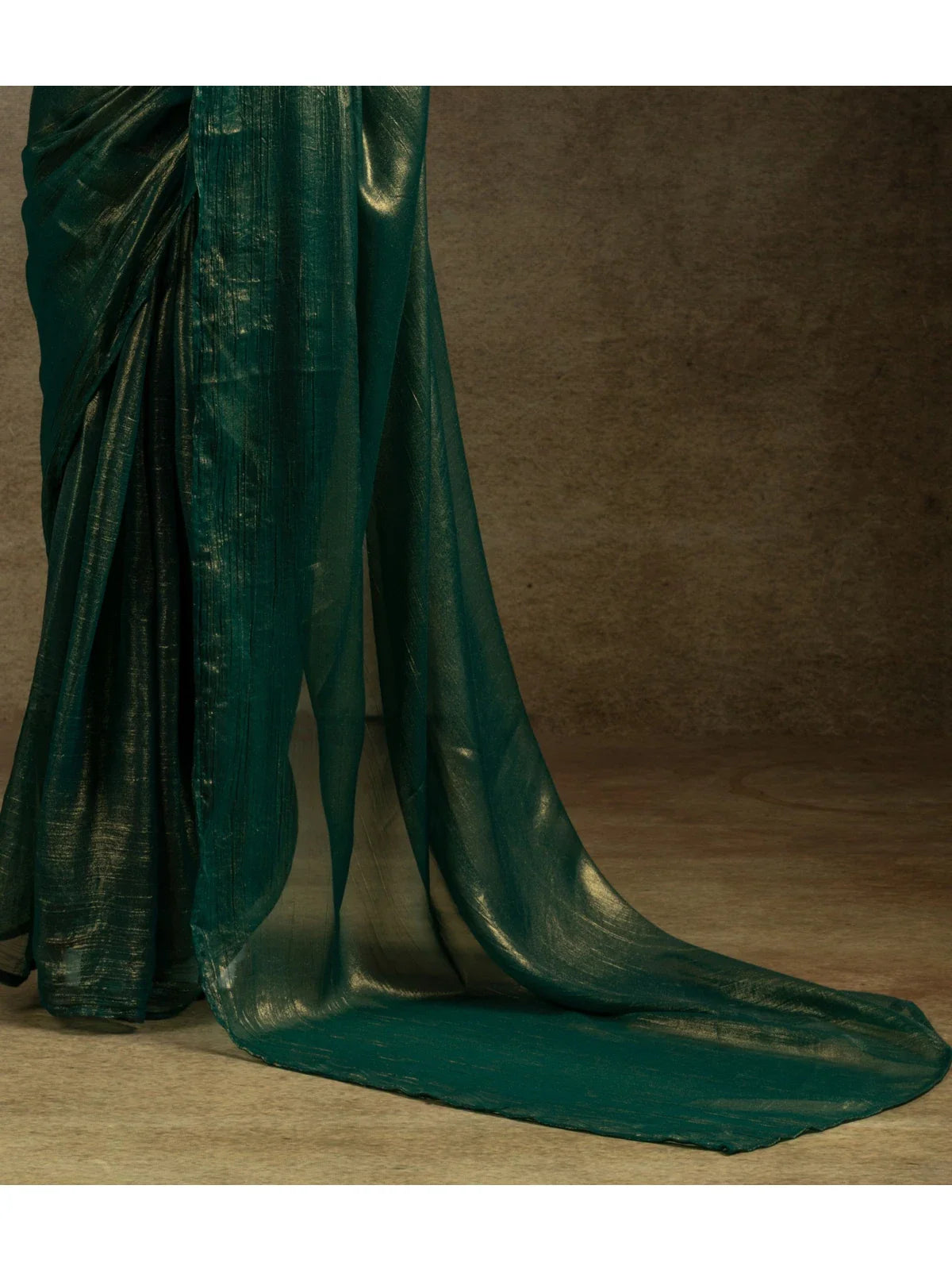 Tarani satin chiffon saree green pallu drape flowing texture closeup