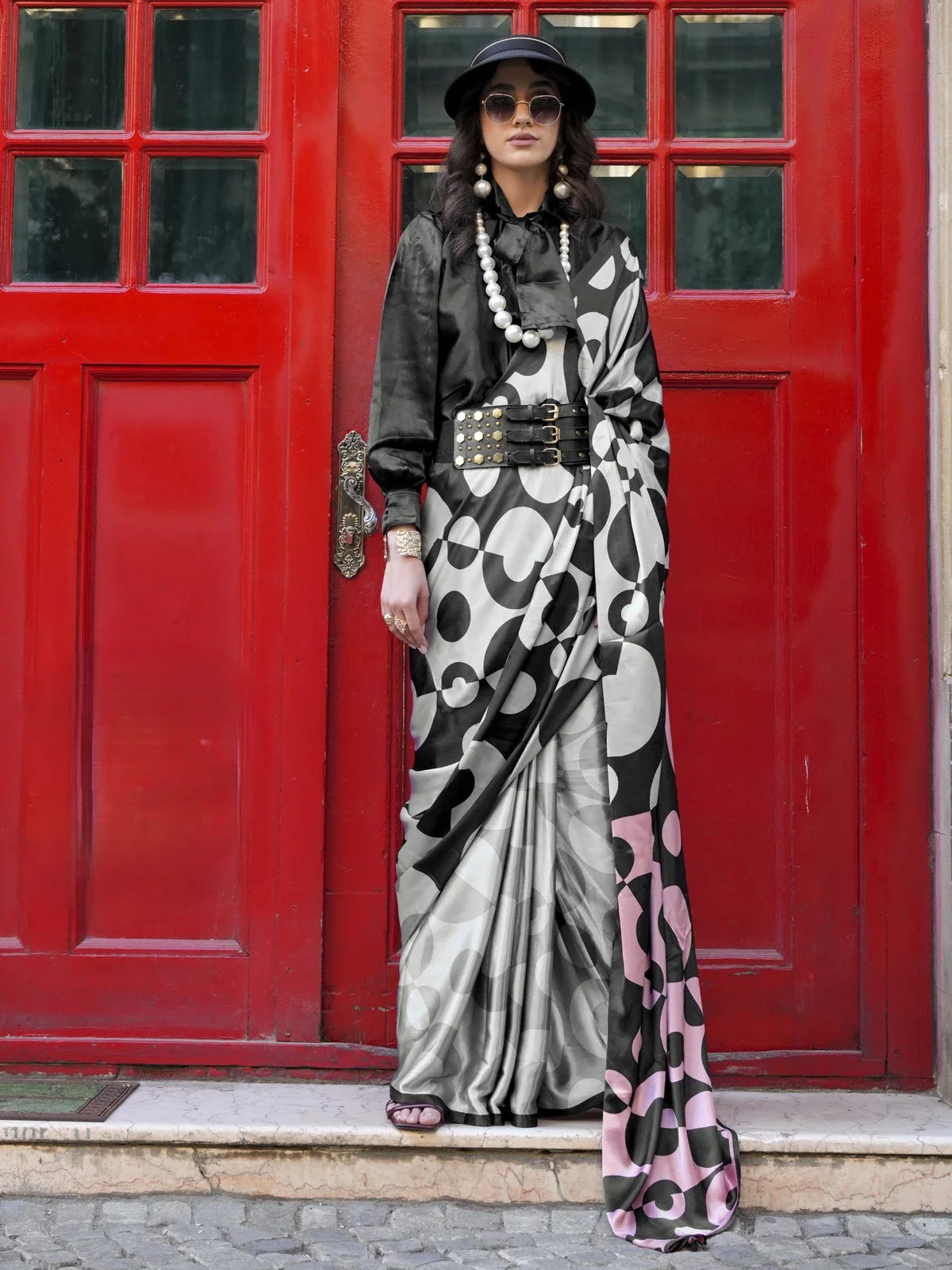 Tarani modern black white pink polka satin saree with stylish blouse and bold accessories