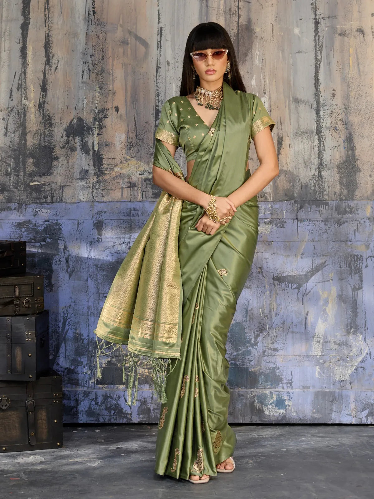 Tarani party wear green satin saree full view with luxurious woven pallu and tassels