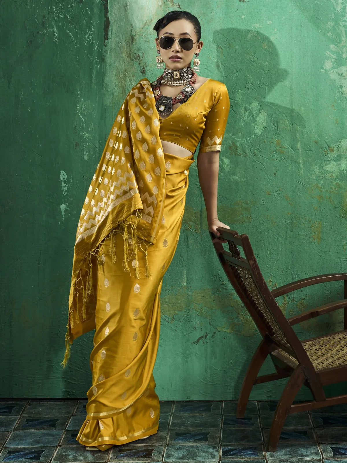 Tarani Leena mustard satin saree front view featuring elegant drape and festive styling