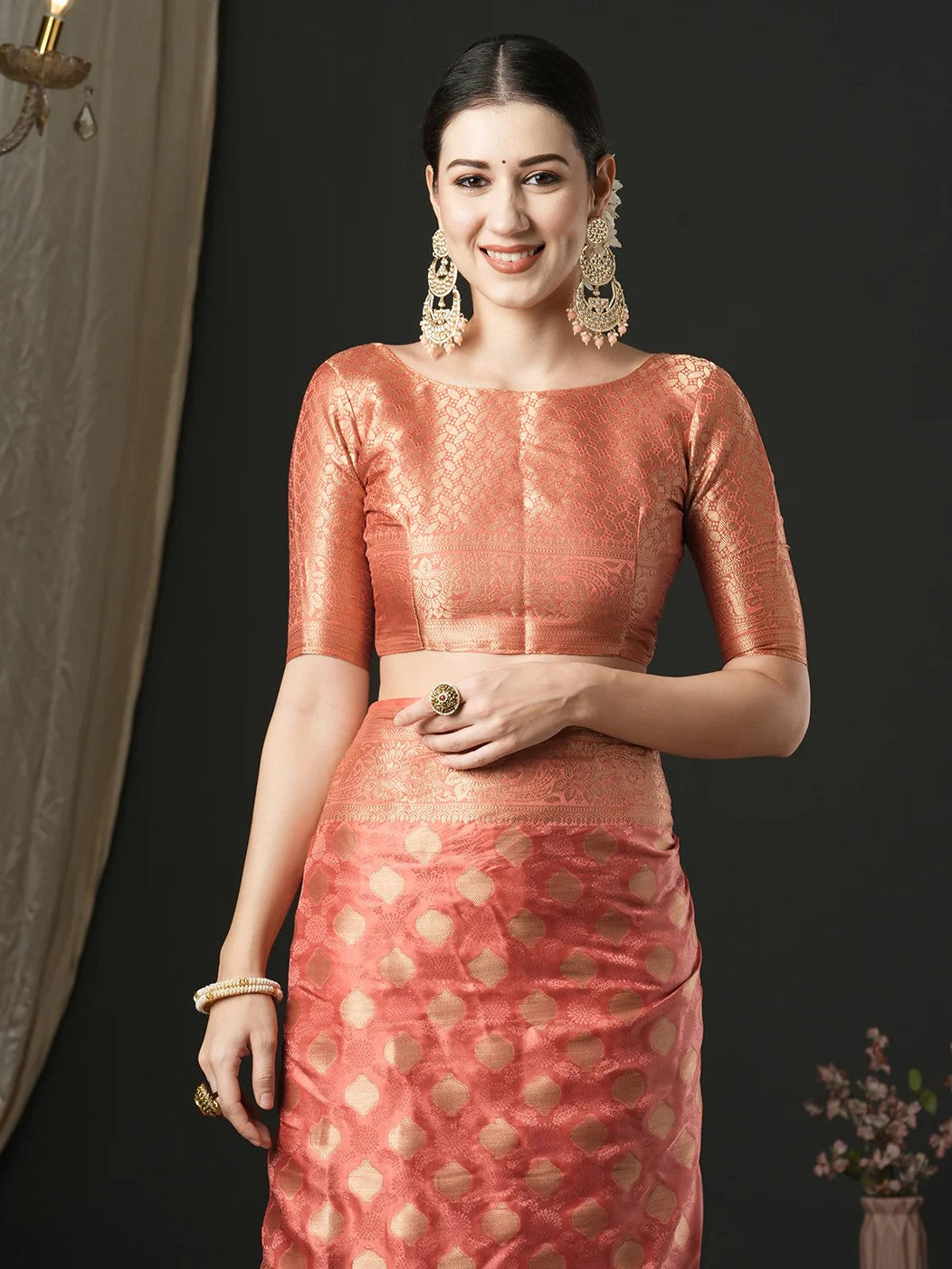 Tarani upper body view satin silk saree in peach with elegant blouse design