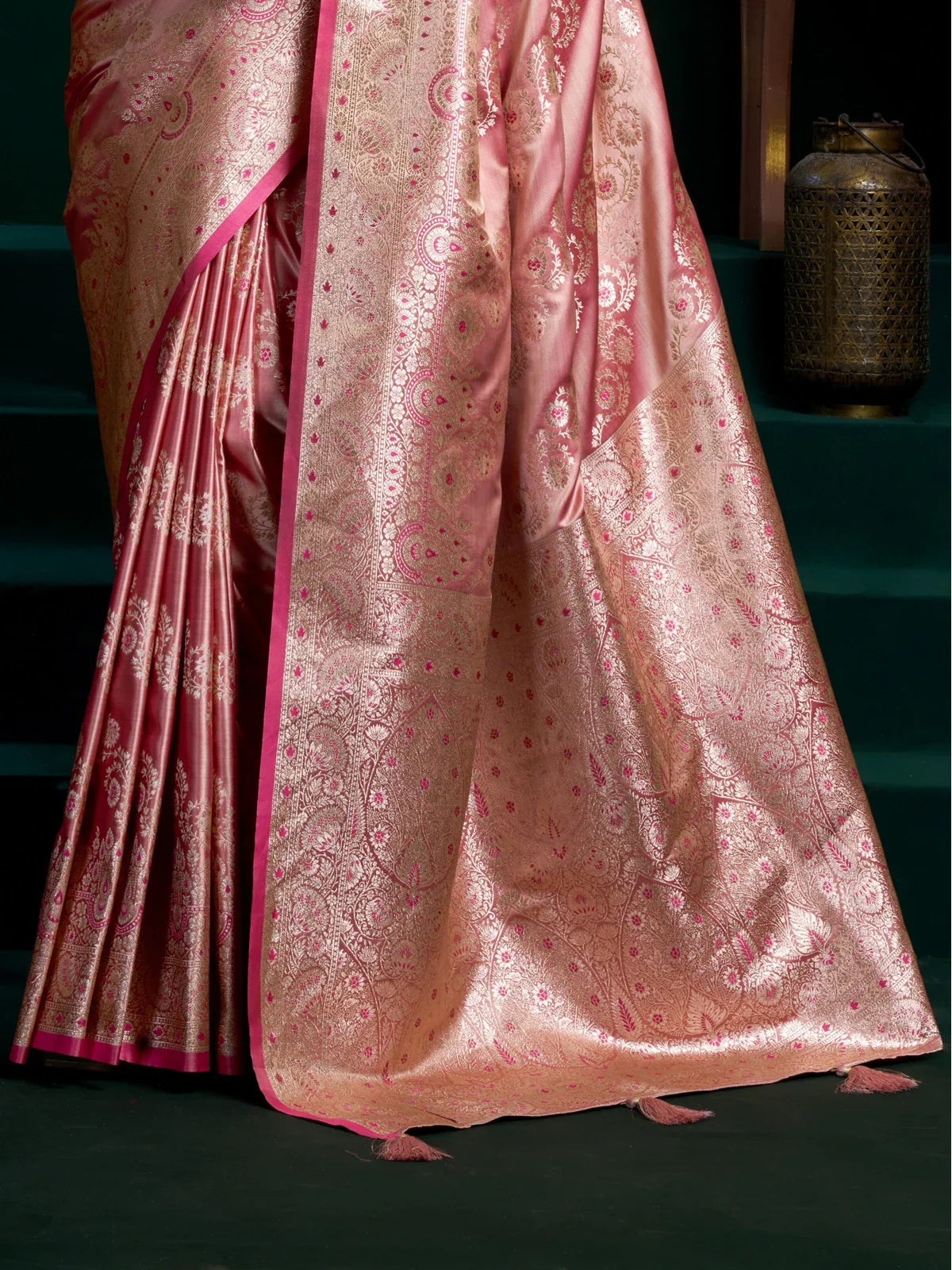 Tarani pink satin saree pallu and woven motifs in traditional party wear style