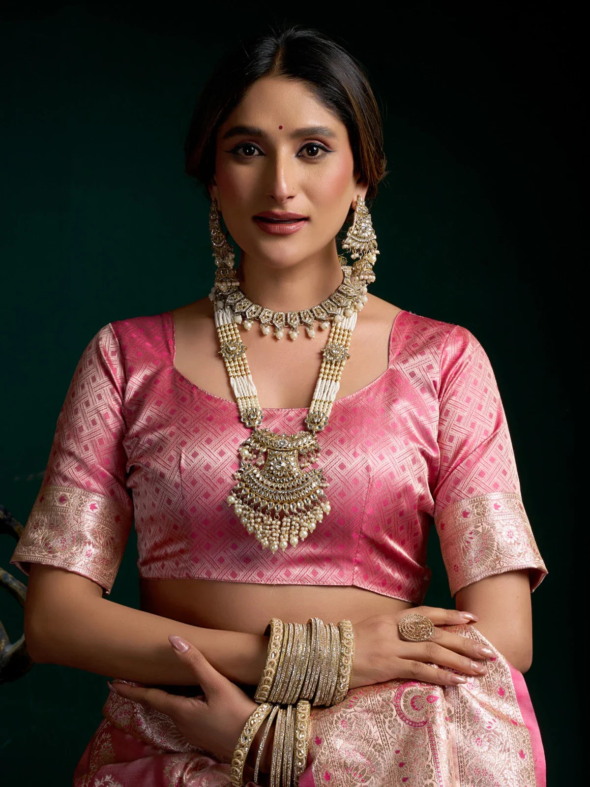 Tarani pink satin silk saree closeup view of blouse and jewellery styling