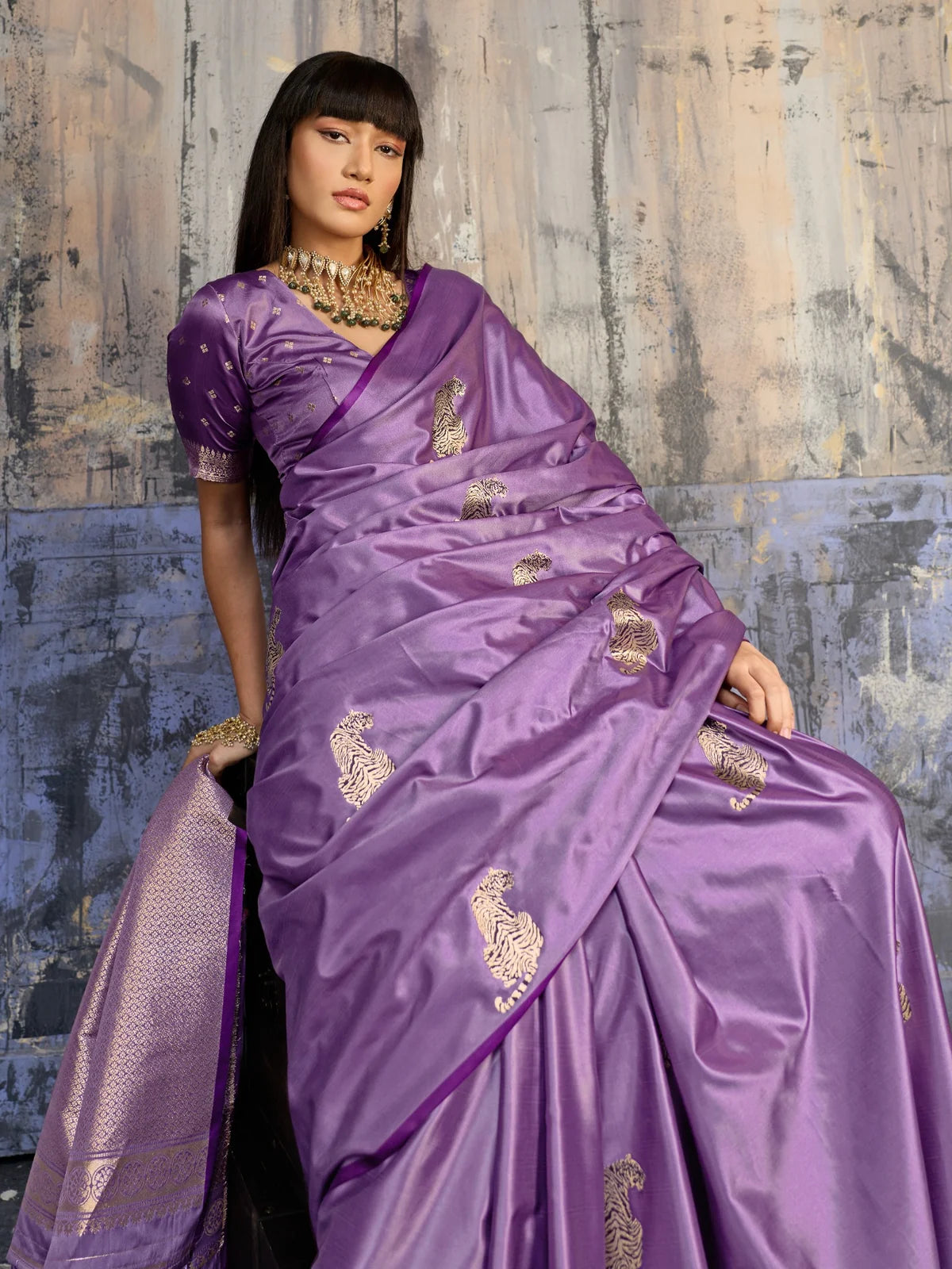 Tarani elegant purple satin saree front pose with rich woven border and handloom work